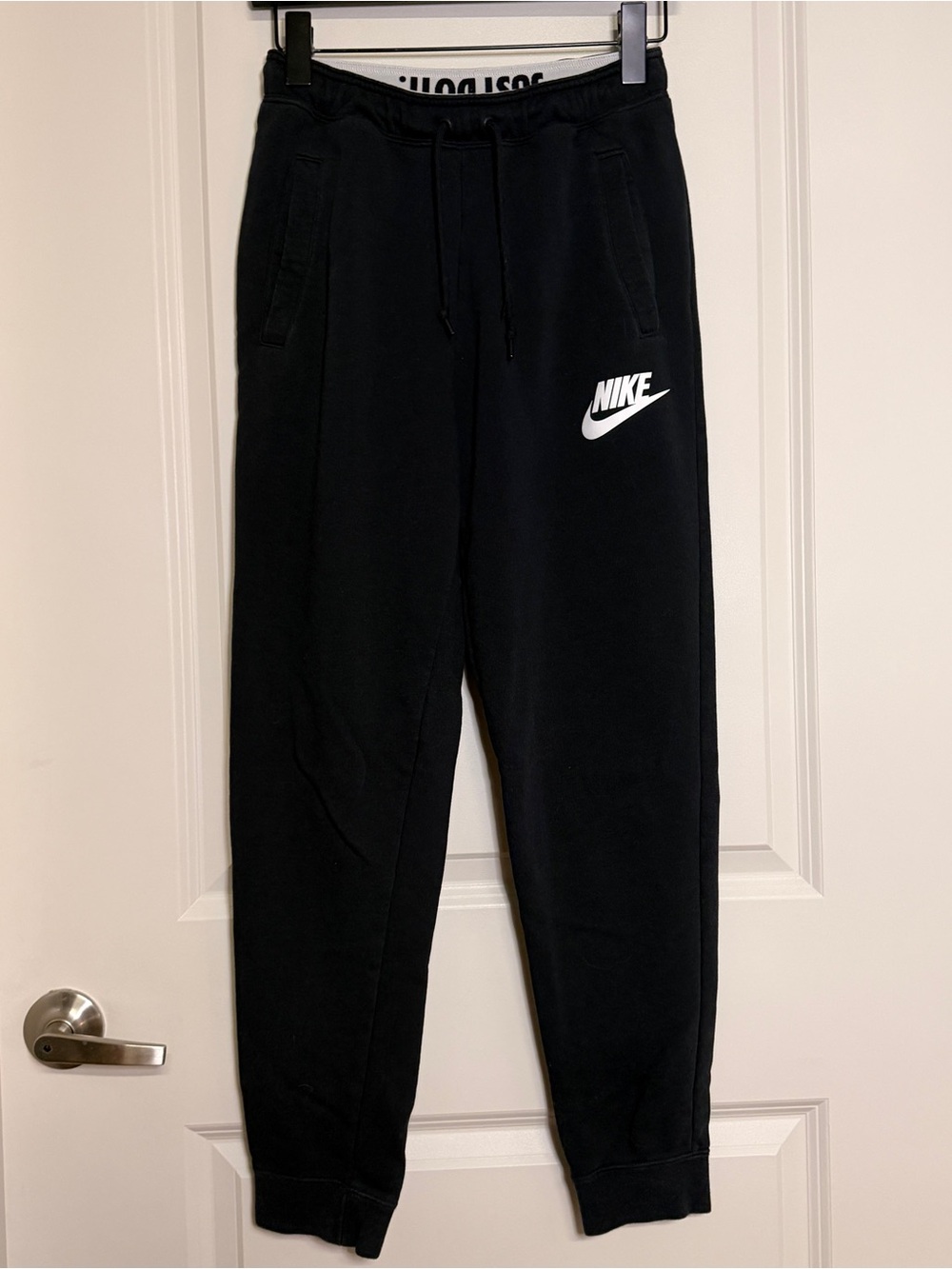 Nike Black Sweatpants with White Swoosh Logo